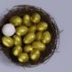 golden-eggs-packaged-in-nest