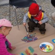 Kids-painting-on-cardboard-box