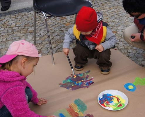 Kids-painting-on-cardboard-box