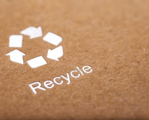 recycle logo on cardboard pacakging