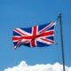British-flag-flying-blue-sky-background
