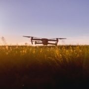 drone-launching-from-field-as-sun-rises