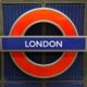 London-underground-sign-on-blue-background