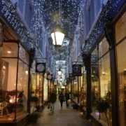 Cardiff-cafes-in-arcade-with-lights-and-shoppers